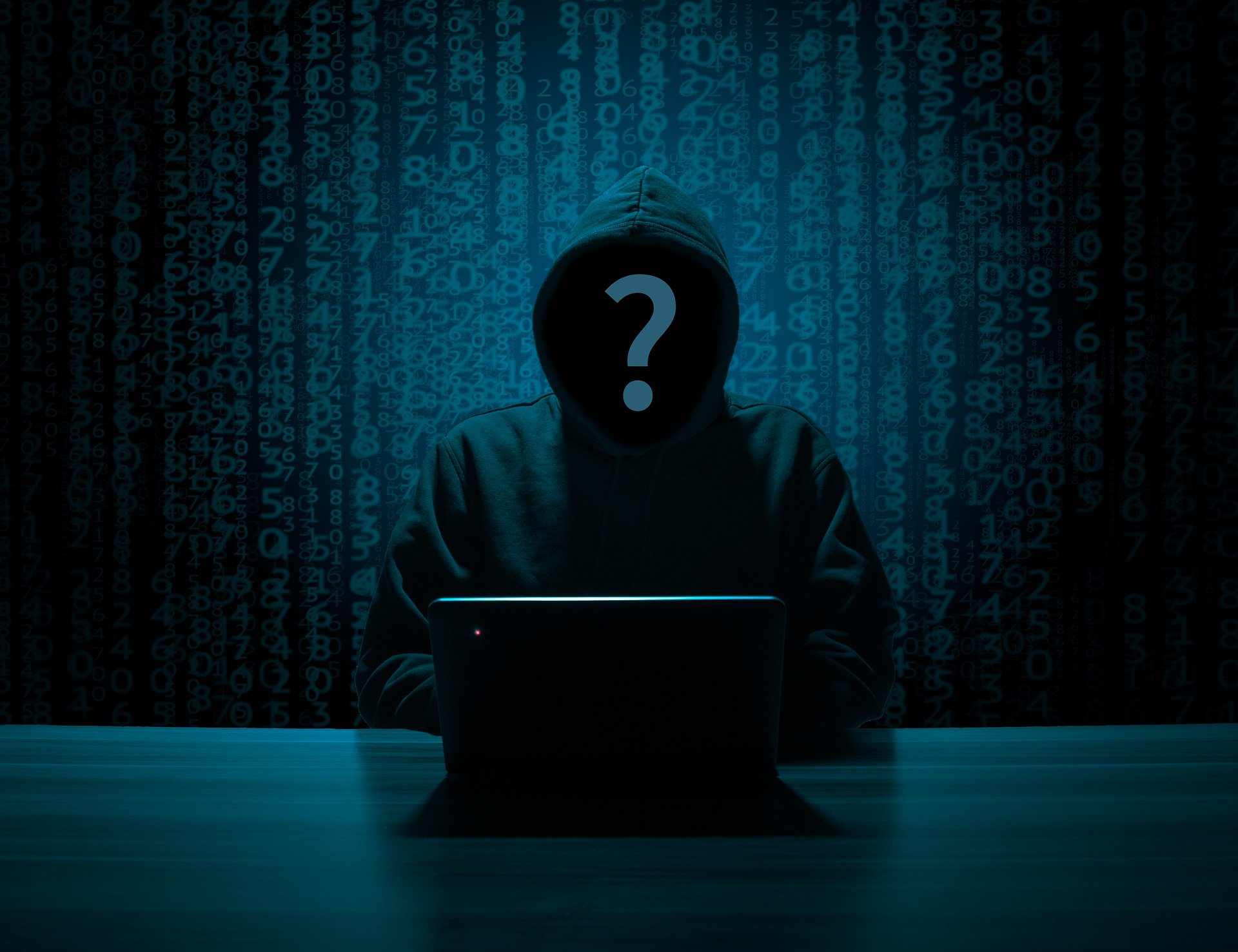 A mysteries hacker behind a computer